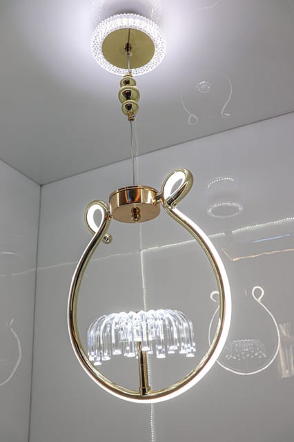 Modern Elegance with the Gold Loop Crystal Pendant Light